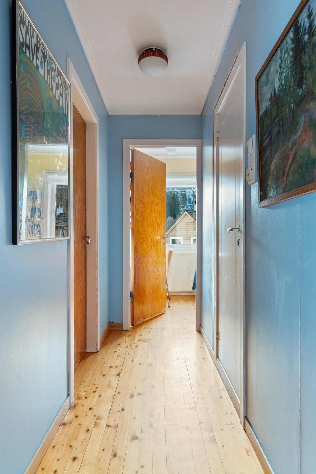 Gang malt i delikat blåfarge som skaper varme og harmoni. Galleribilde