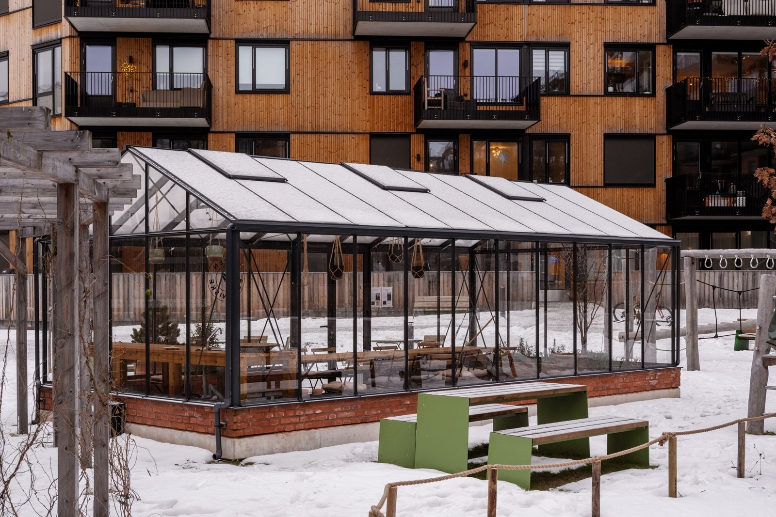 I fellesområdet finnes et drivhus som kan benyttes av beboerne. Galleribilde