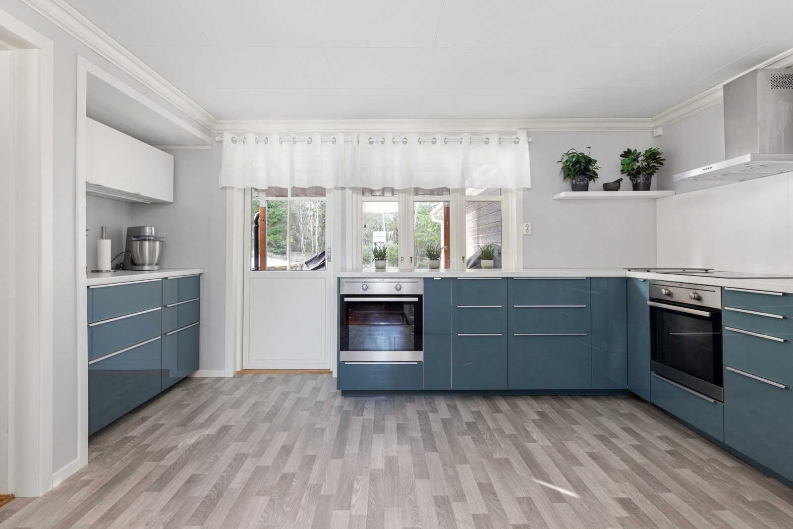 Det er to integrerte stekeovner samt en induksjonstopp. Galleribilde