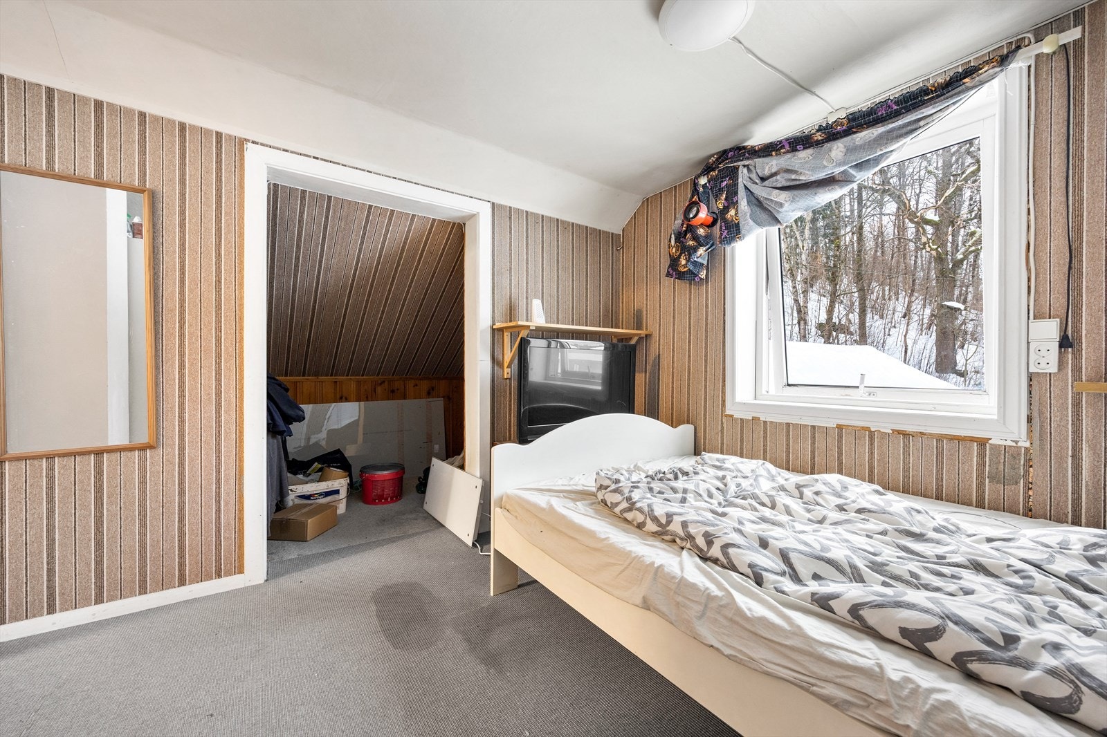 Rommet har også tilknytning til en praktisk bod for ytterligere oppbevaring. Galleribilde