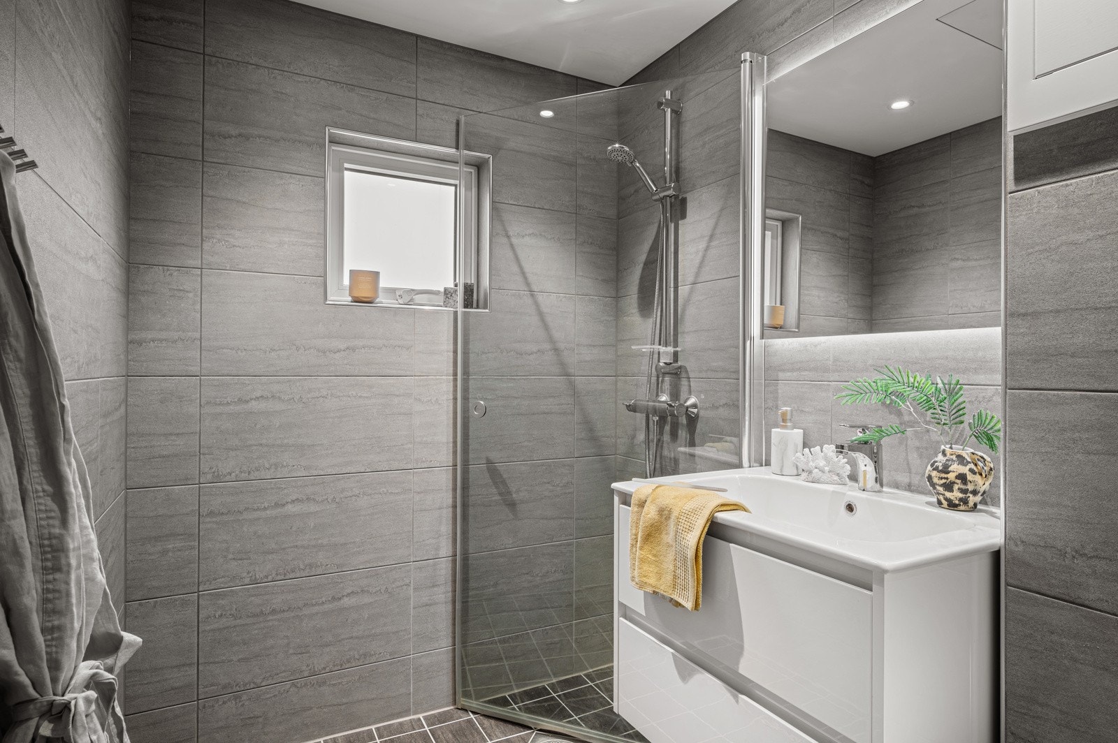 Badet ble pusset opp i regi av borettslaget i 2019 og fremstår som både pent og moderne. Galleribilde