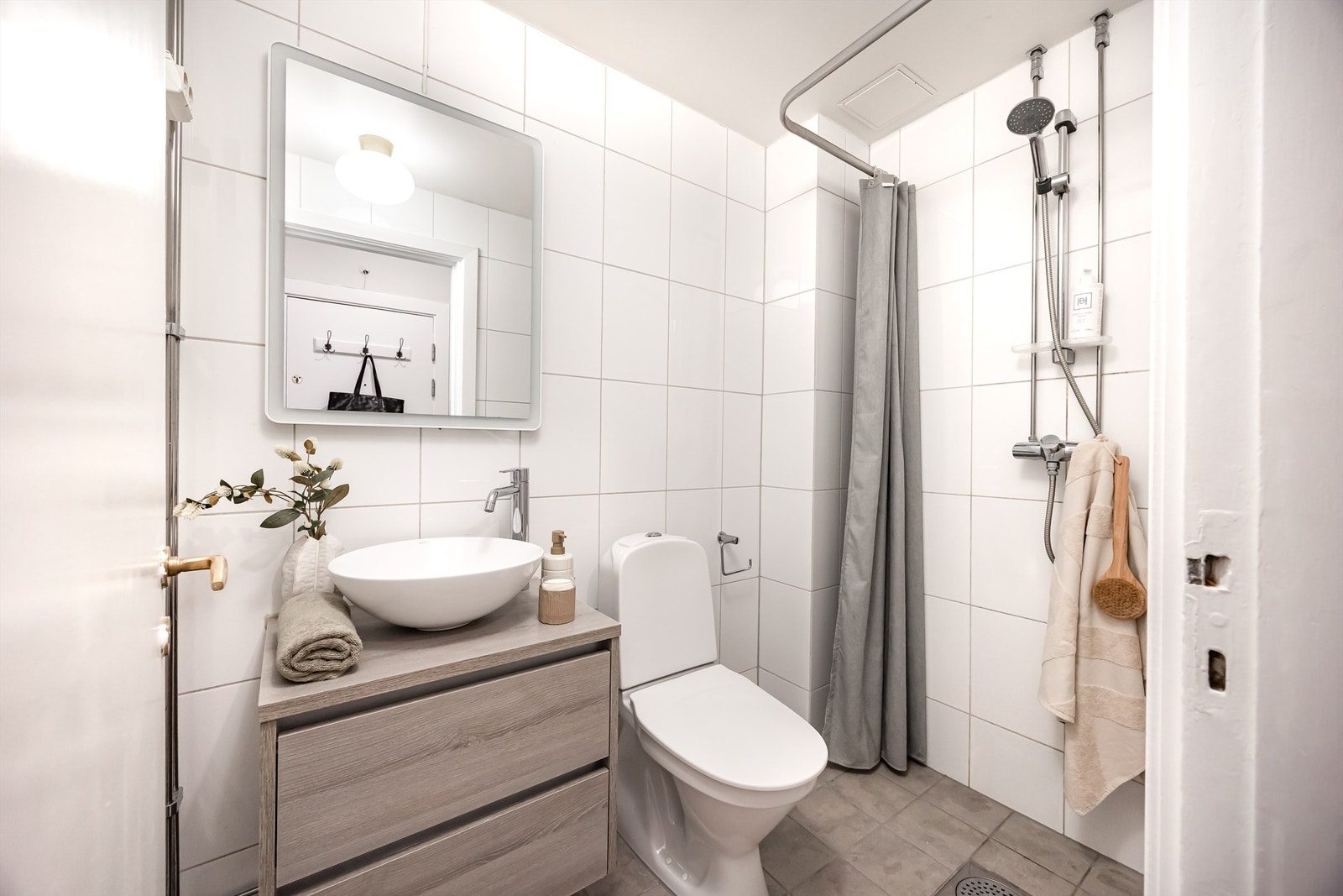 Tidløst bad fra 2009 med varmekabler i gulvet. Galleribilde