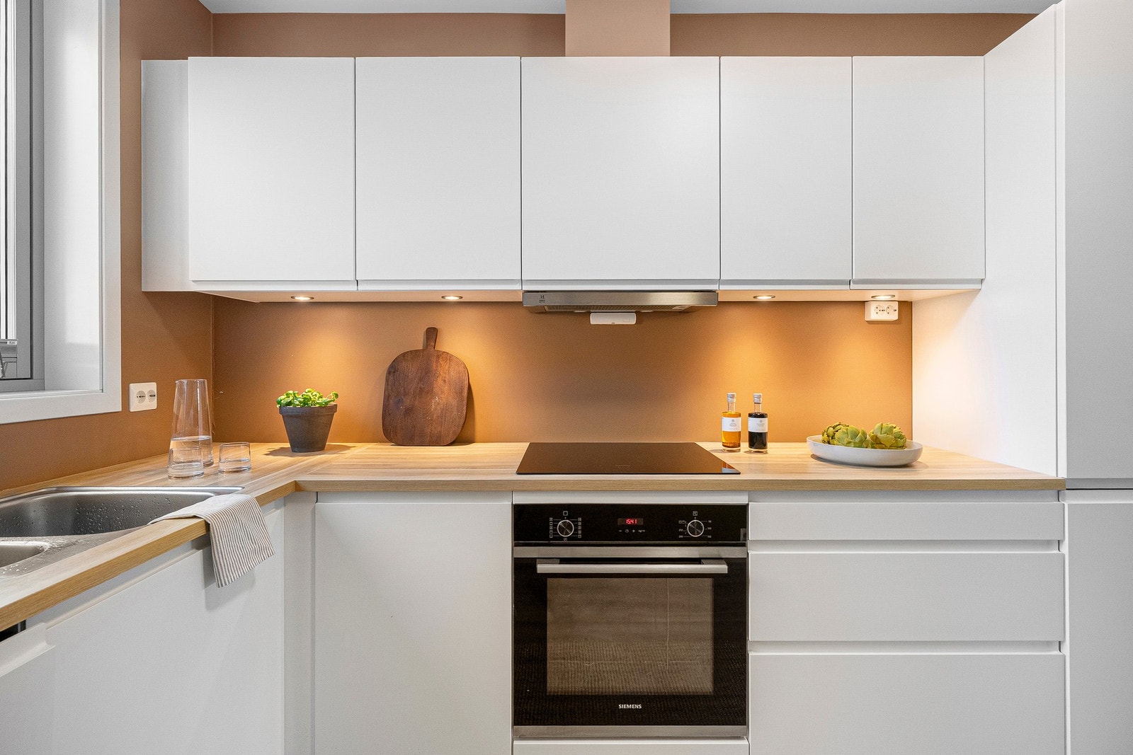 Integrerte hvitevarer sørger for et helhetlig preg og god brukervennlighet. Galleribilde