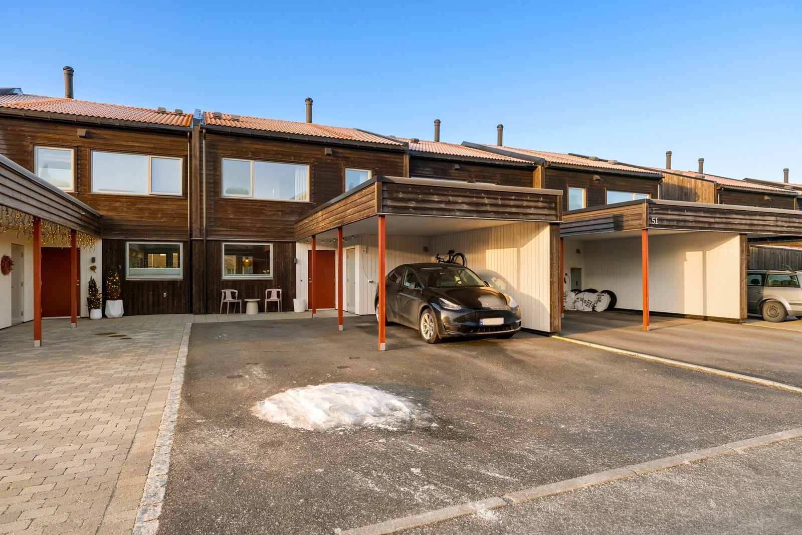 Det er montert elbillader som medfølger handelen. Galleribilde