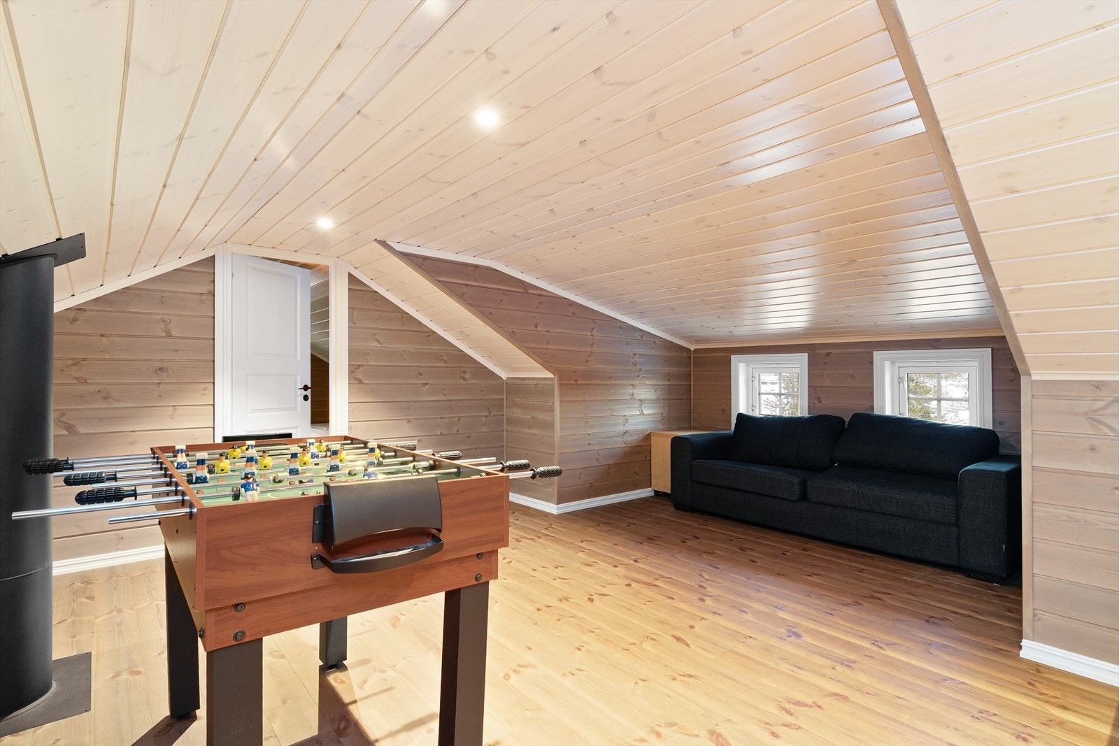 Med sine lune omgivelser gir stuen en koselig atmosfære for hele familien. Galleribilde