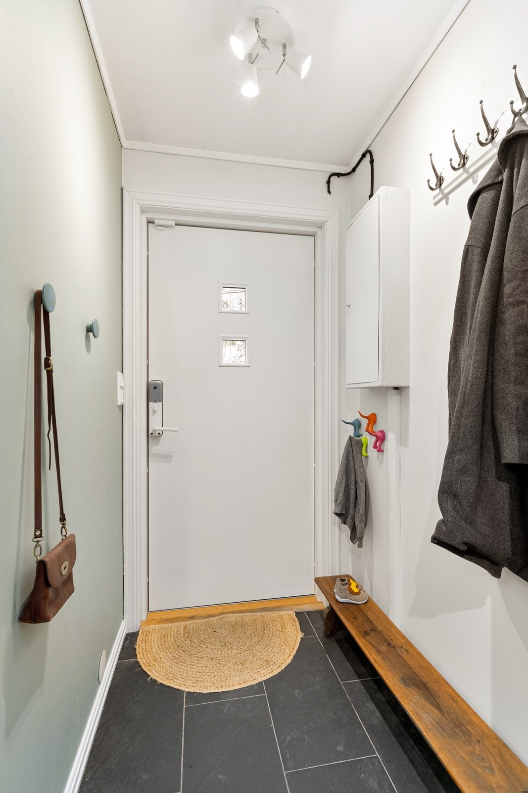 Vindfang med flislagt gulv med gulvvarme. Galleribilde