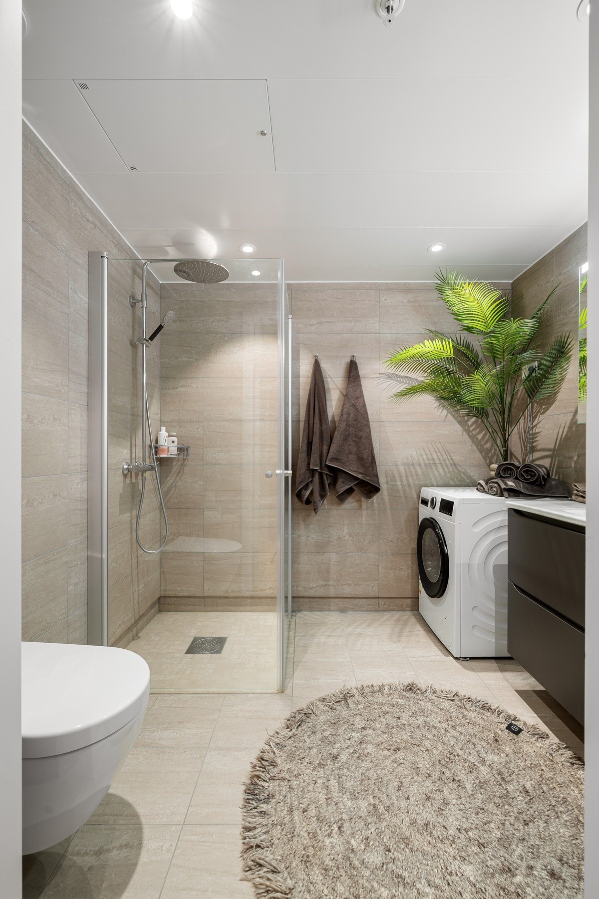 Flislagt bad med varme i gulv Galleribilde