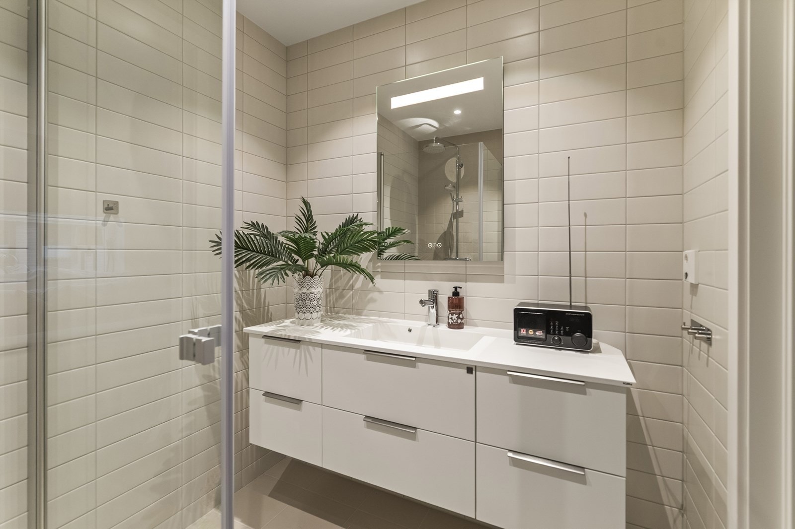 Varmekablene i gulvet bidrar til en behagelig start på dagen. Galleribilde