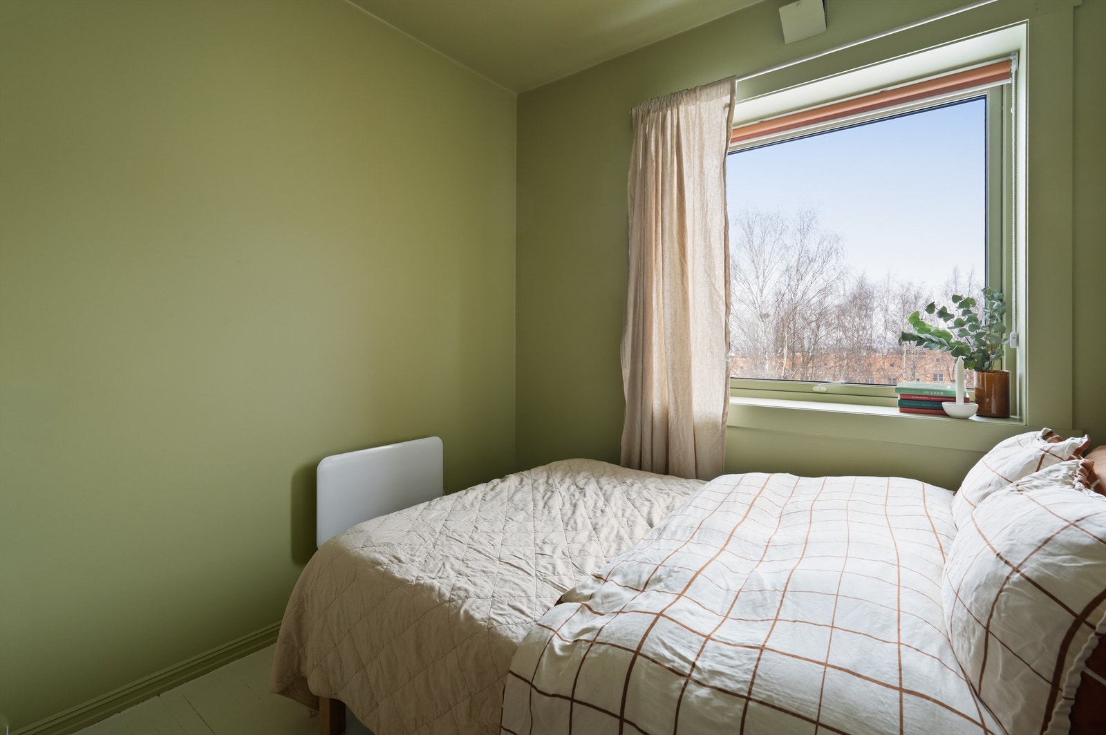 Alle leilighetens soverom er holdt i lune og behagelig nyanser - perfekte for soverommet. Galleribilde