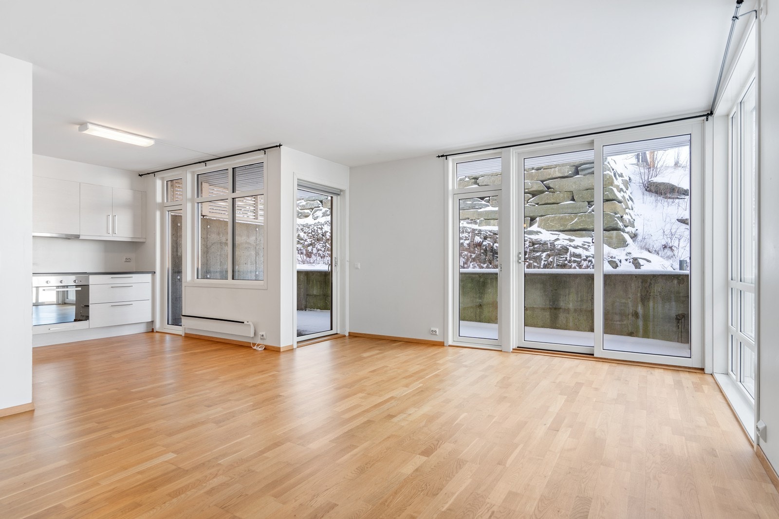 Stue mot kjøkken i åpen løsning Galleribilde