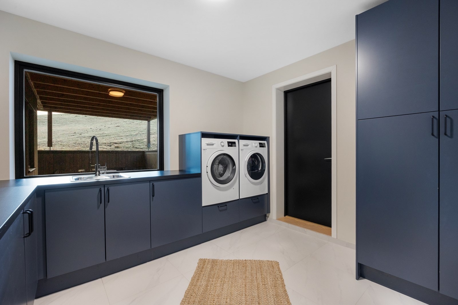 Eget vaskerom med egen inngang og innredning levert av Epoq. Galleribilde