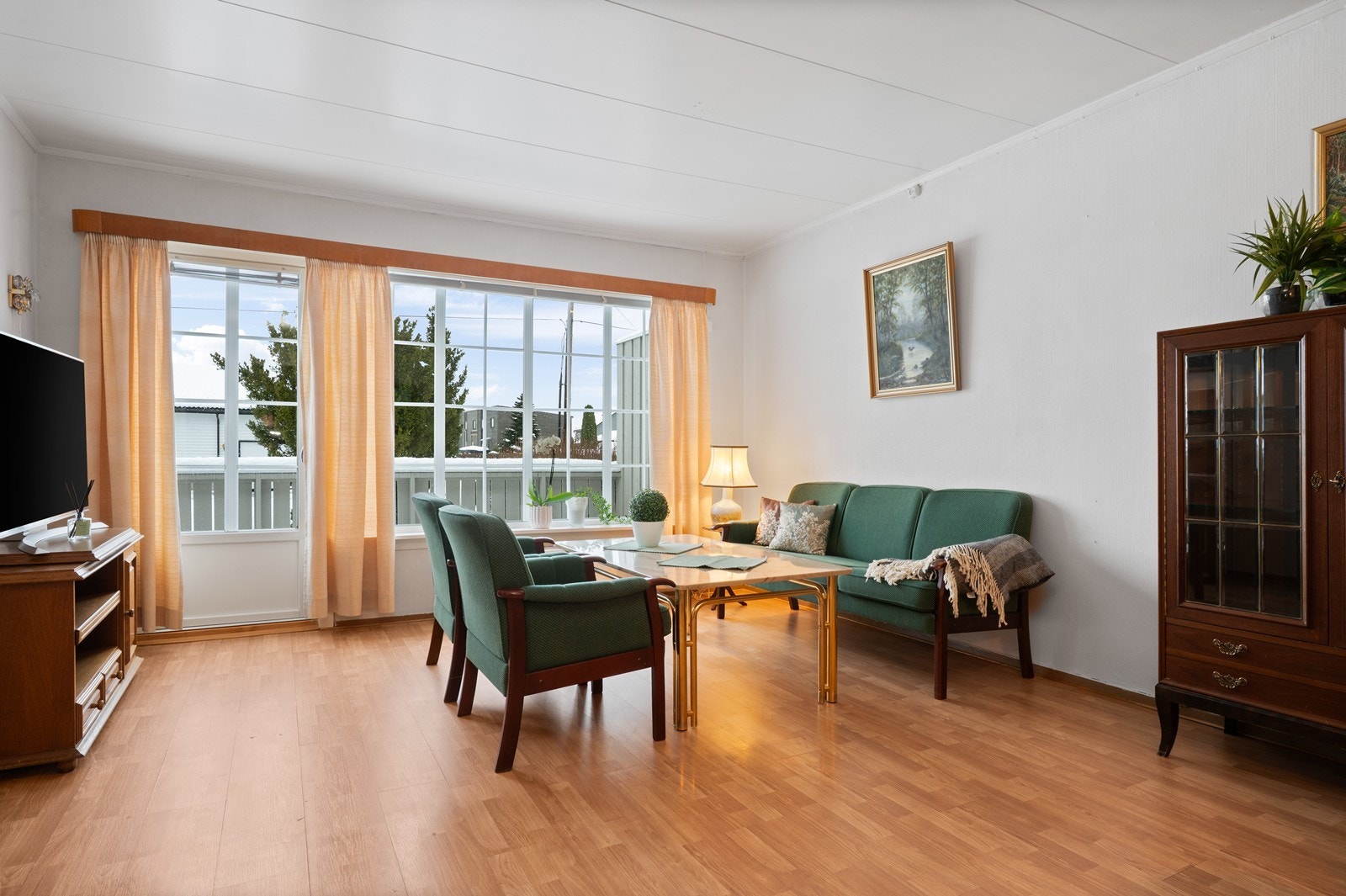 Fra stuen er det direkte utgang til en skjermet terrasse. Galleribilde