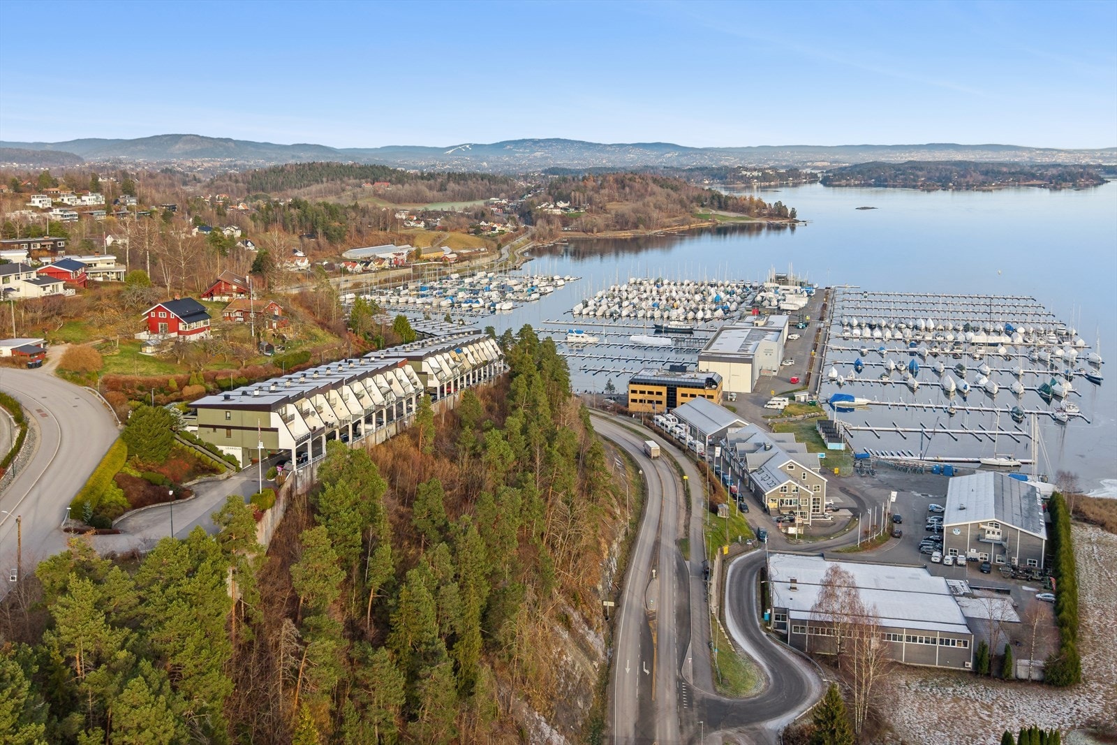 Det er godt med gjesteparkeringsplasser i sameiet. Galleribilde