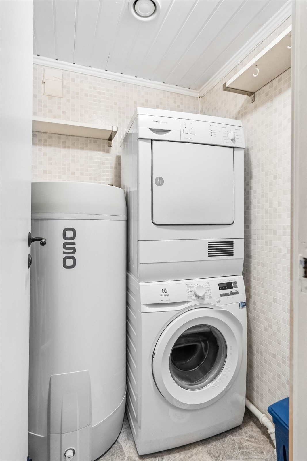 Boligen har et vaskerom med opplegg for vaskemaskin samt plass til tørketrommel. Galleribilde