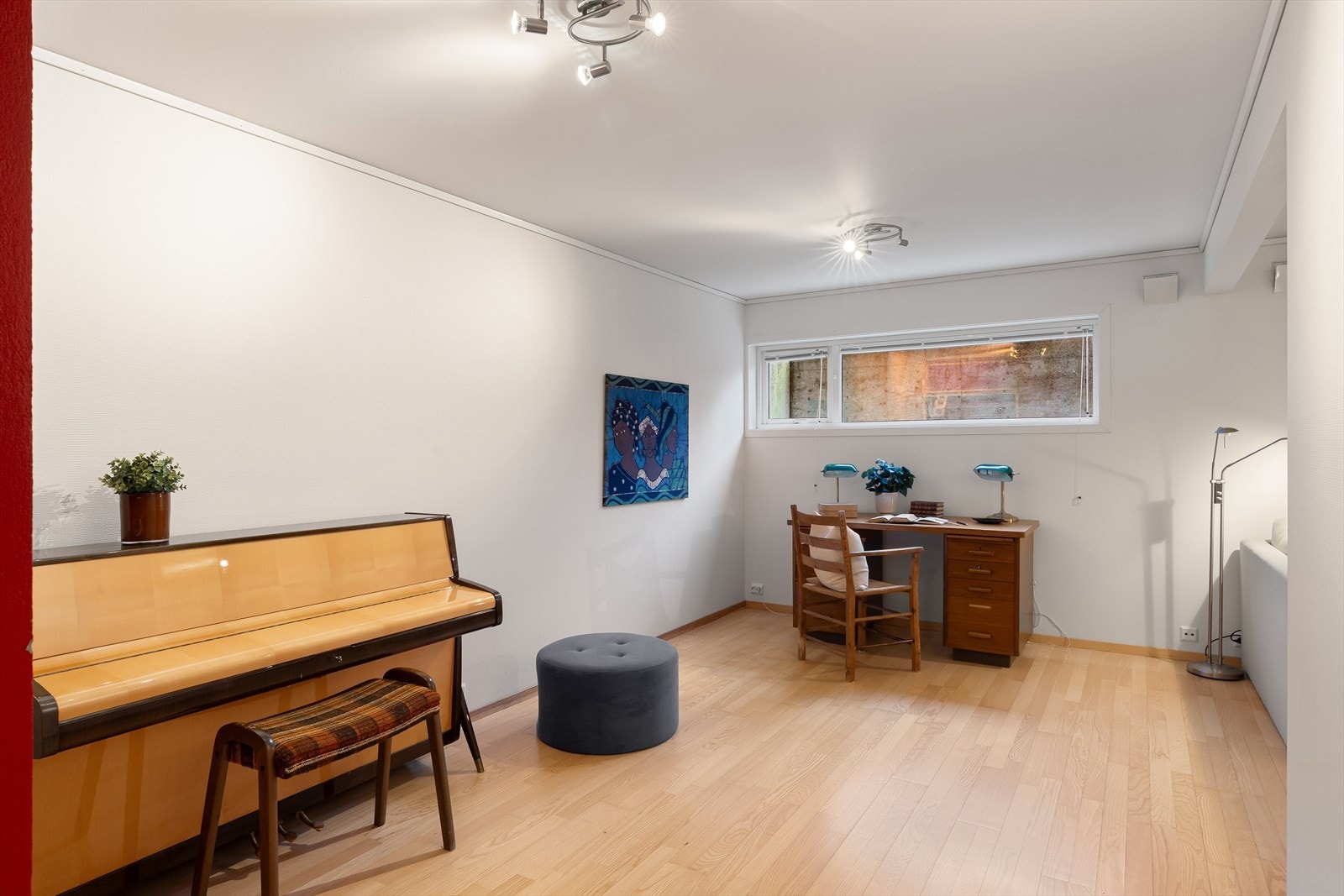 Vegg mellom rom merket som hobby og hobby/redskap på byggemeldte tegninger er fjernet, og hele arealet benyttes i dag som kjellerstue Galleribilde