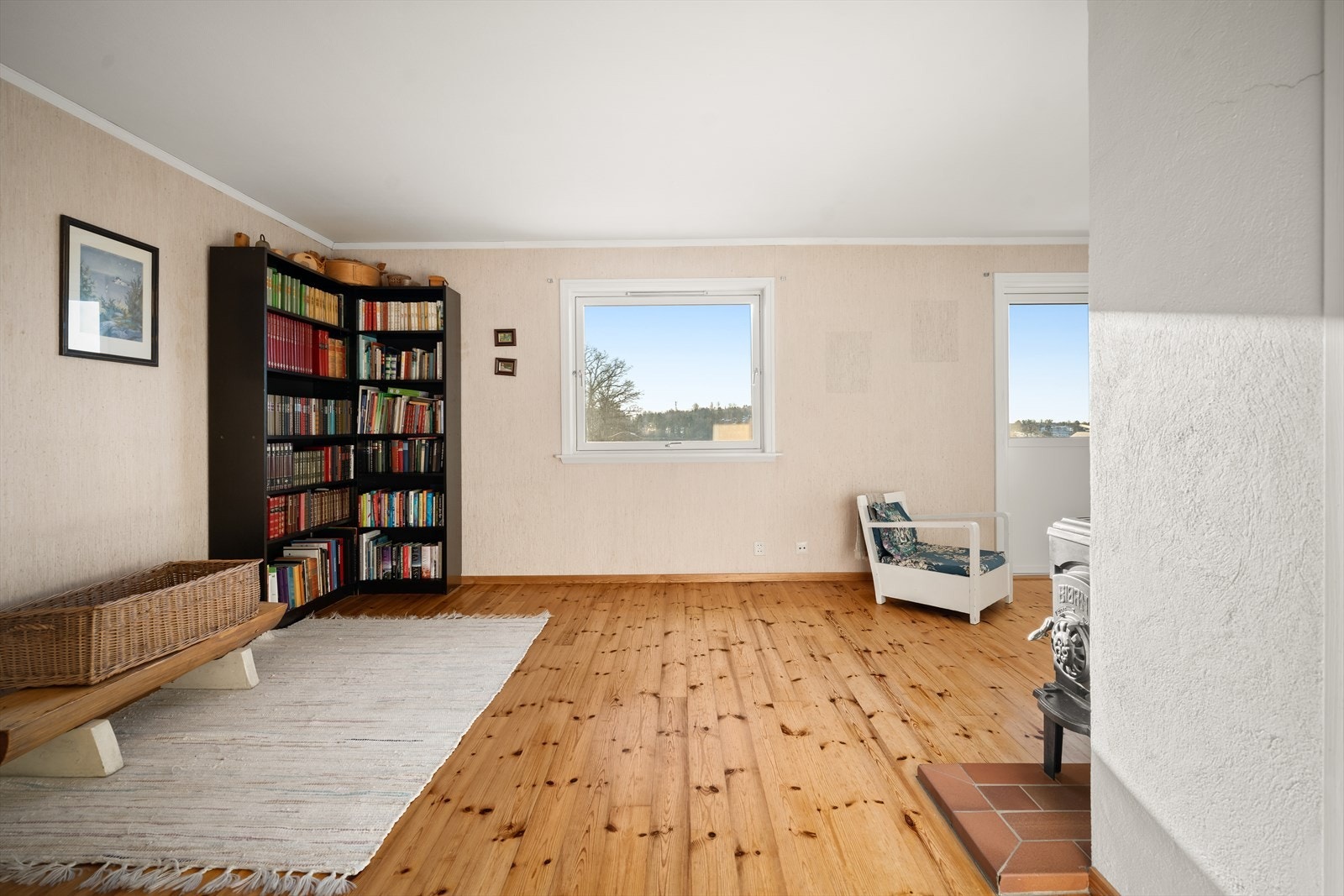 Loftstuen gir familien et ekstra, adskilt oppholdsrom. Galleribilde