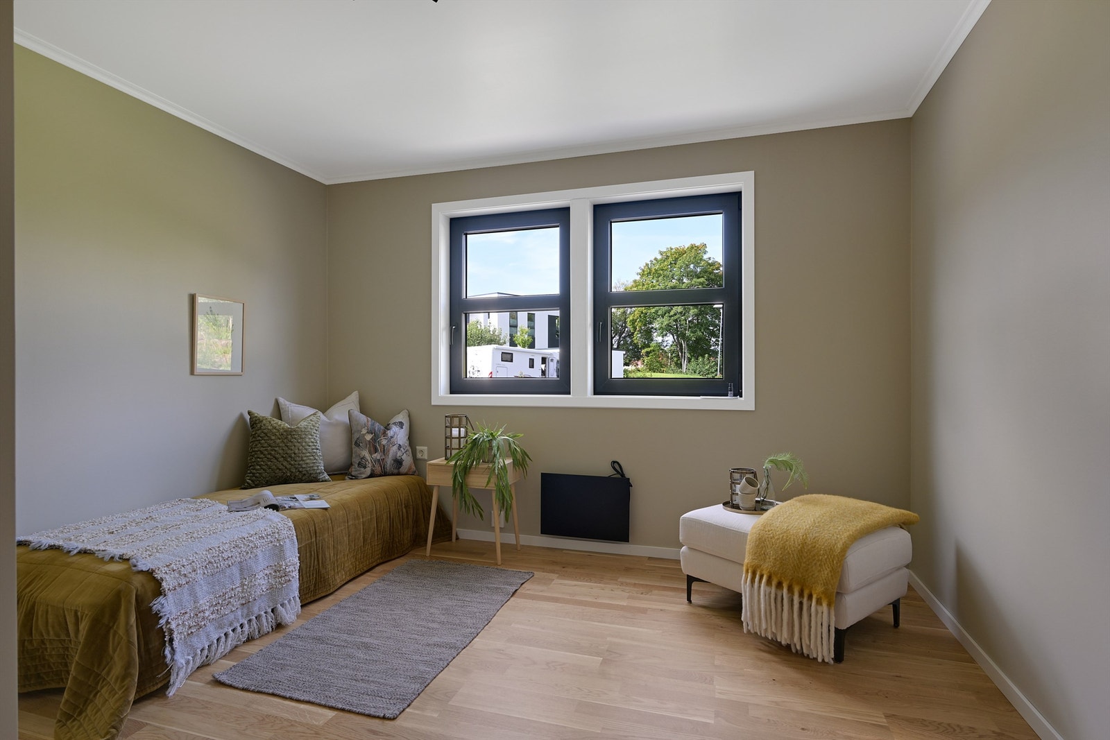 Soverommet er malt i en lun farge som gir en behagelig atmosfære. Galleribilde