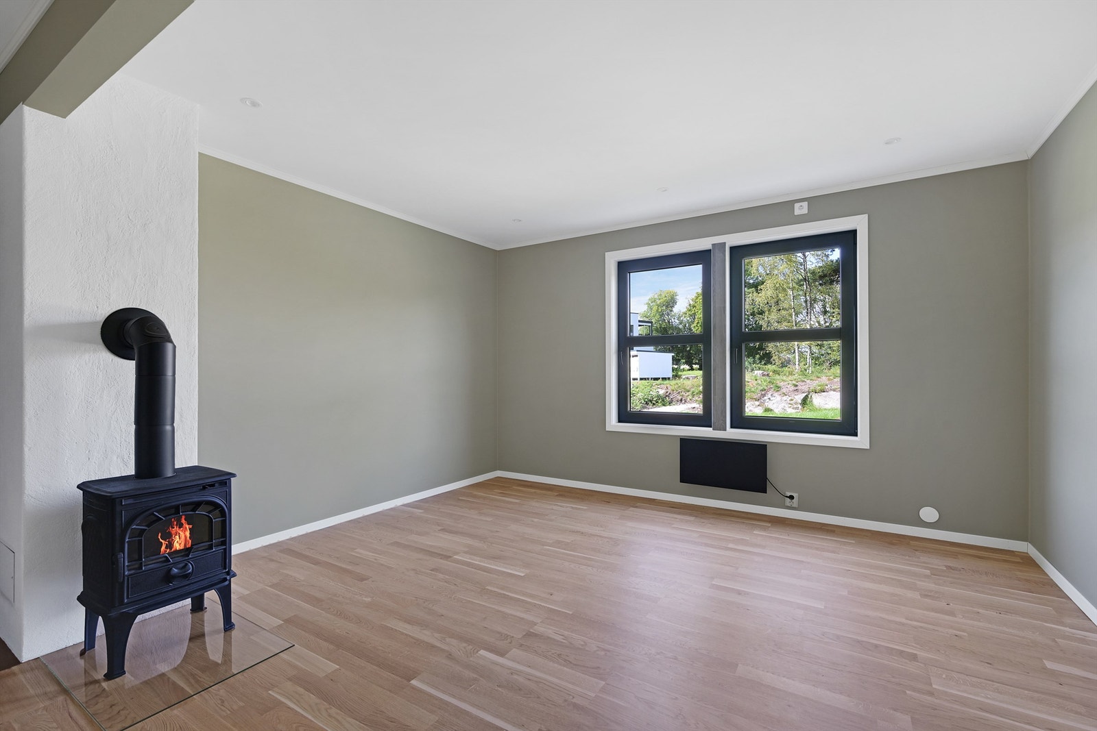 Her er det god plass til å innrede med en hyggelig sofagruppe med tilhørende møblement. Galleribilde