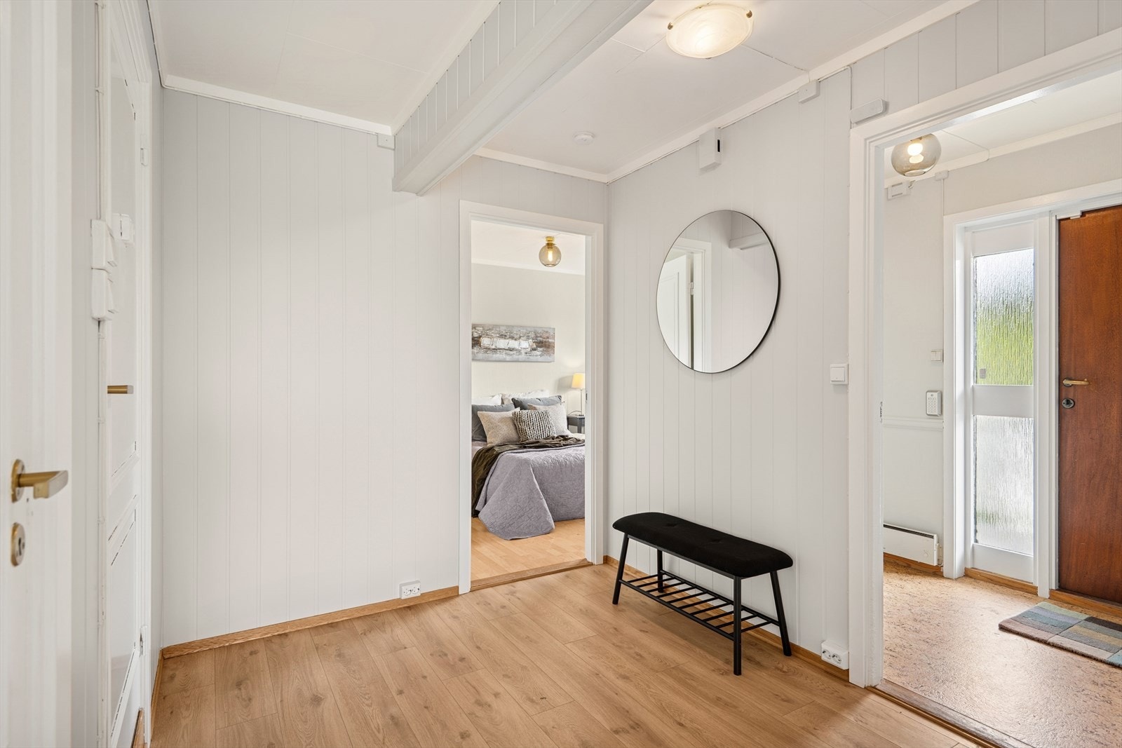 Gangen har en praktisk utforming med enkel tilgang til de øvrige rommene i boligen. Galleribilde