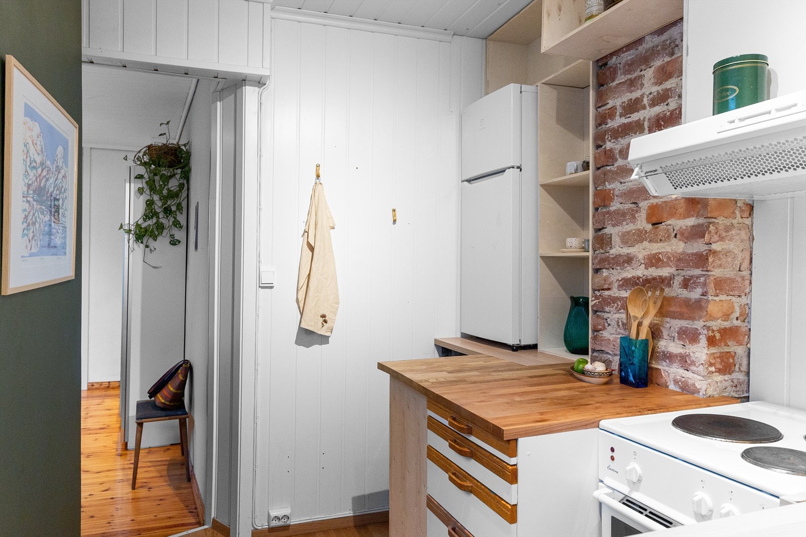 Fra kjøkkenet er det gjennomgang til soverommet. Galleribilde