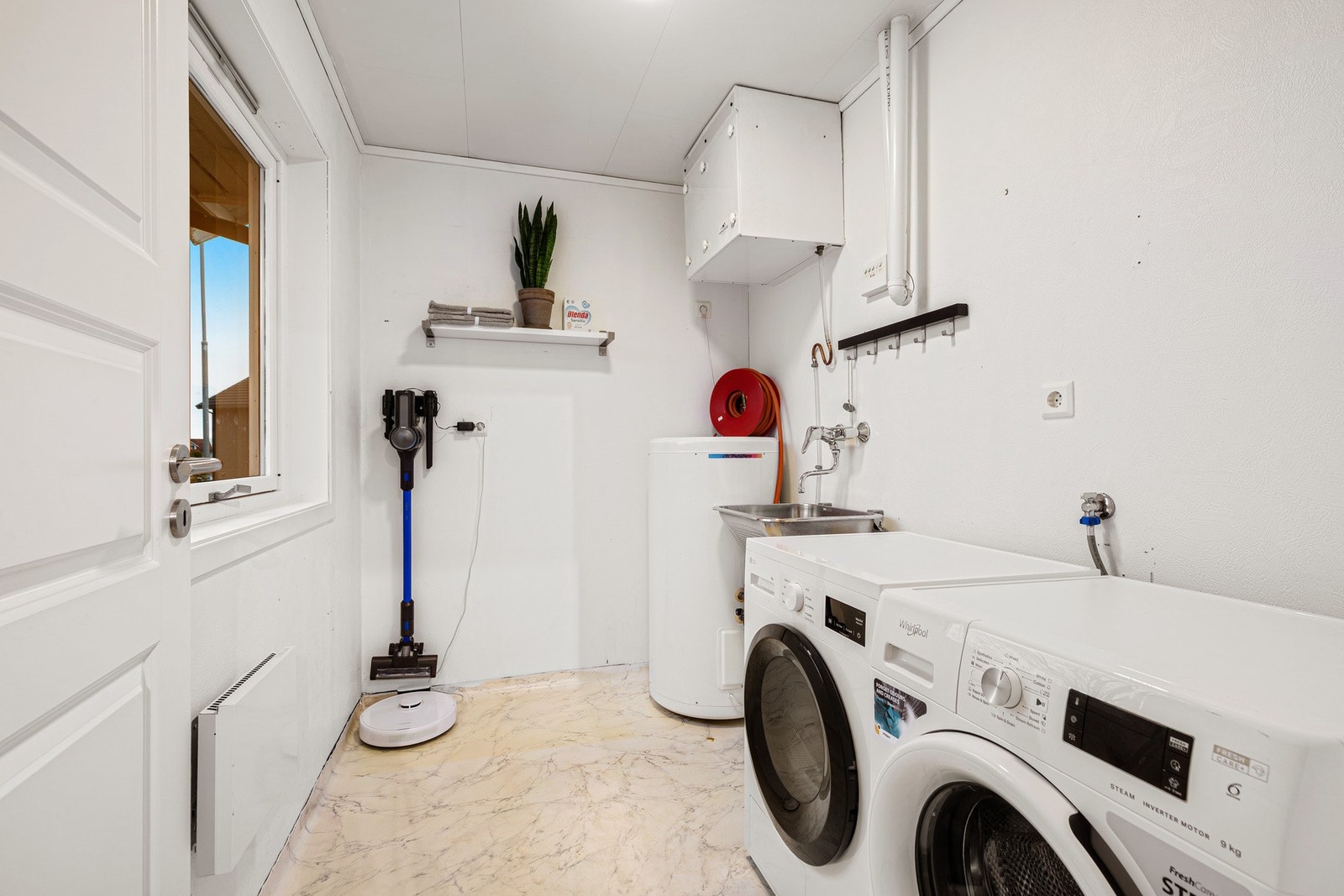 Sportsboden er blitt omgjort til et eget vaskerom. Galleribilde