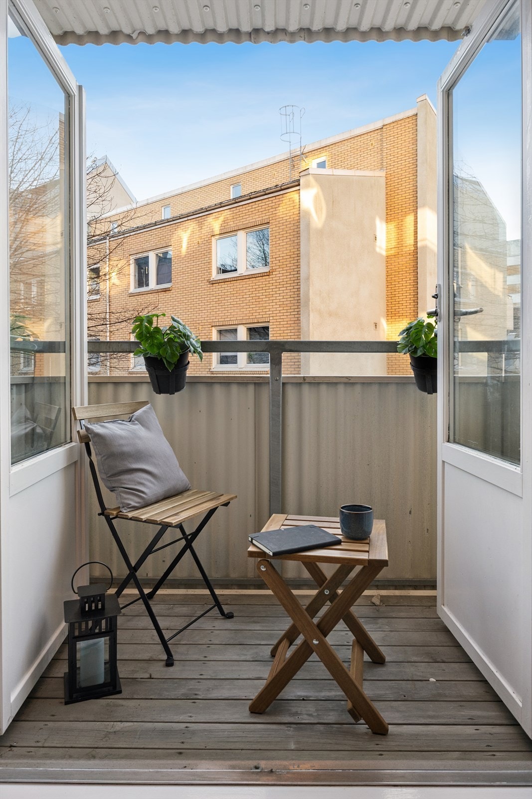 De doble verandadørene kan åpnes helt Galleribilde