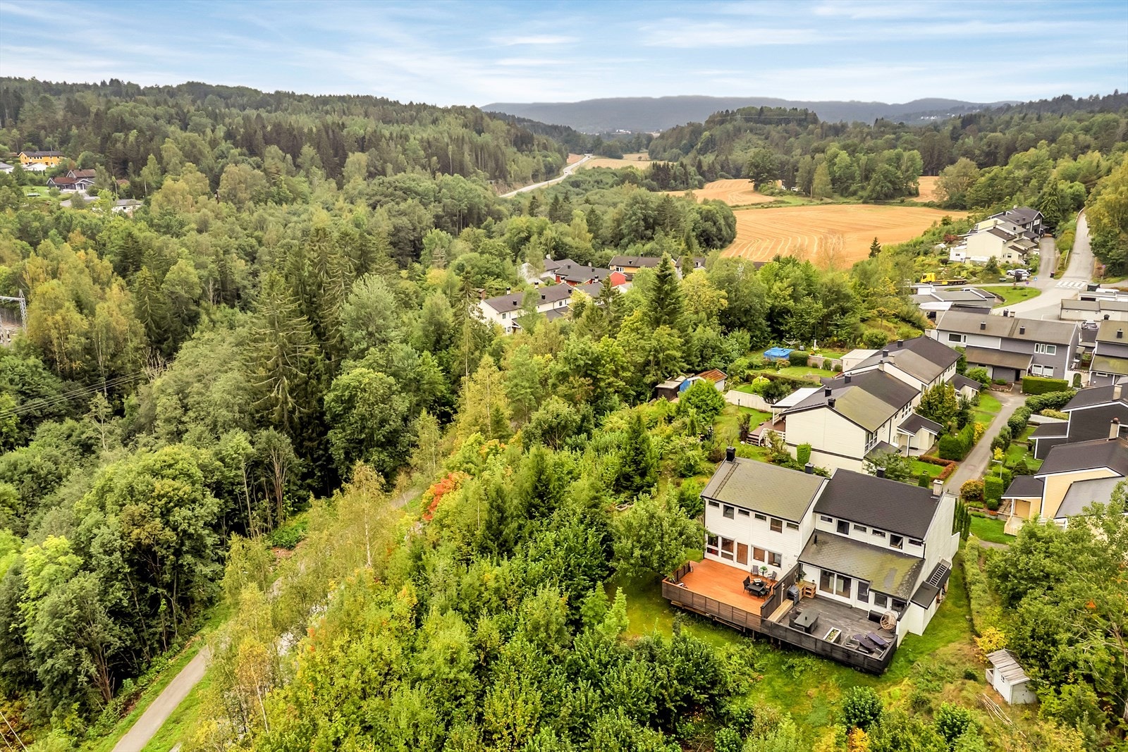 Hagen er vendt mot et frodig og skjermet grøntområde. Galleribilde