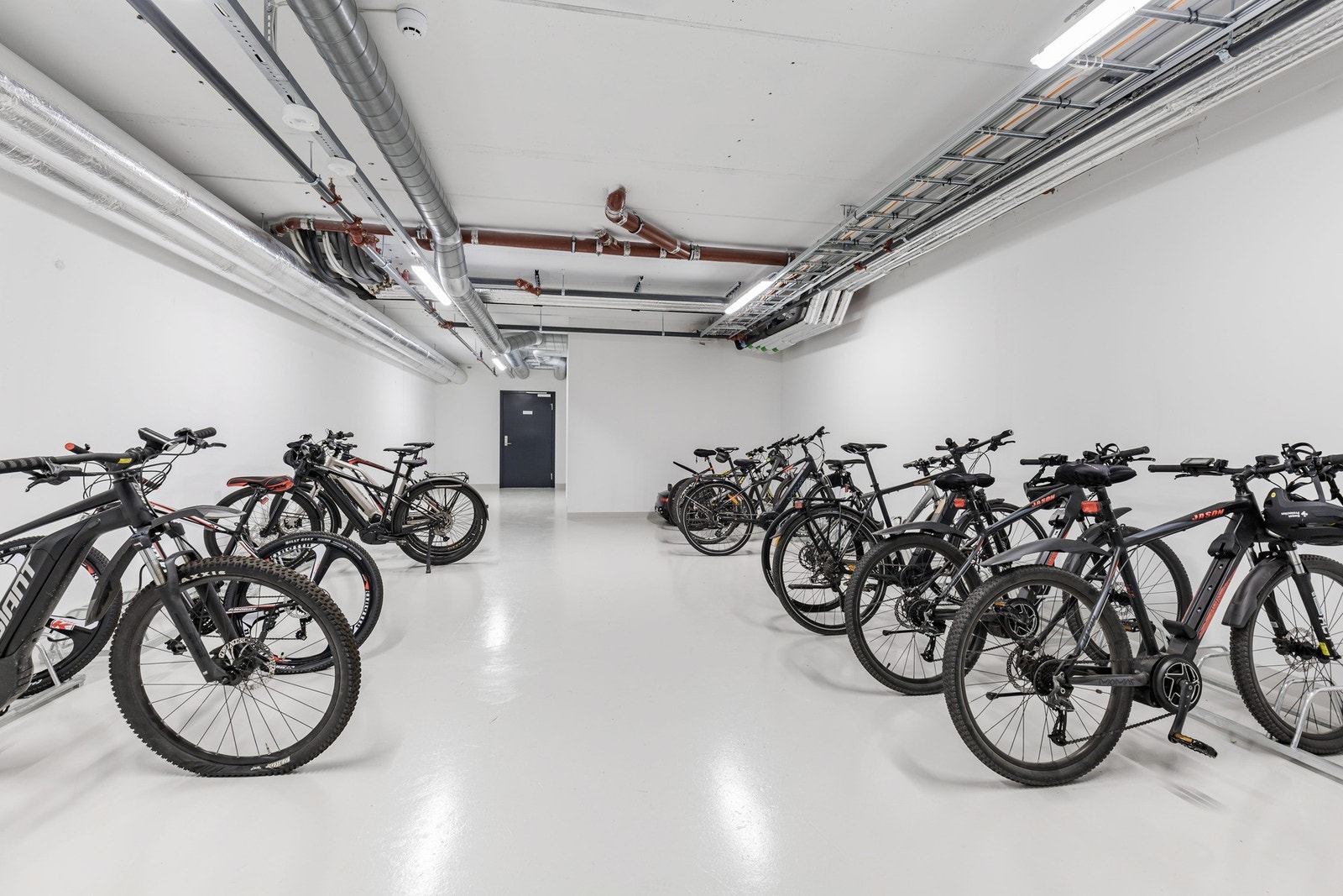 Felles sykkelbod i første etasje. Galleribilde