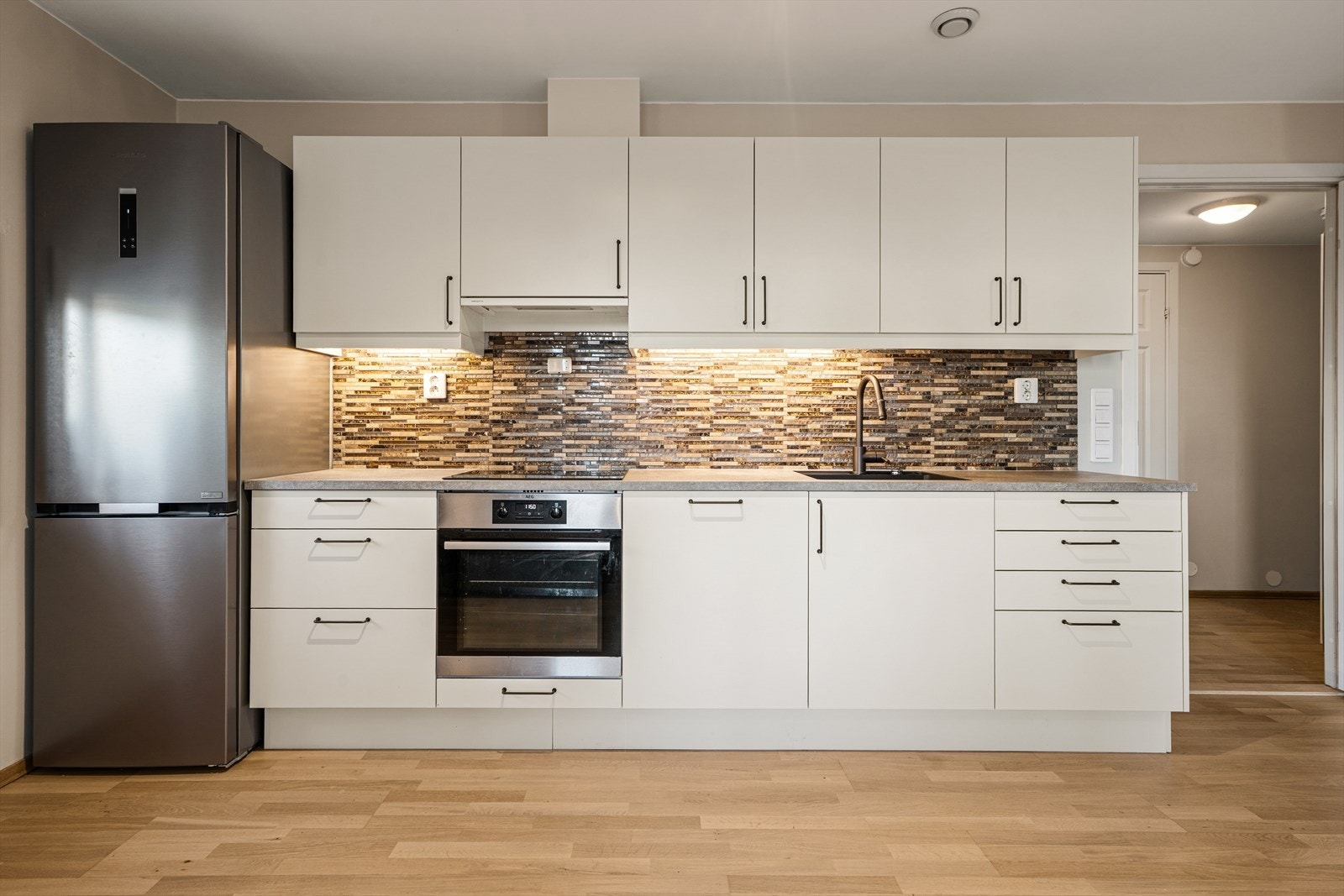 Lyst og praktisk med gjennomtenkte materialvalg Galleribilde