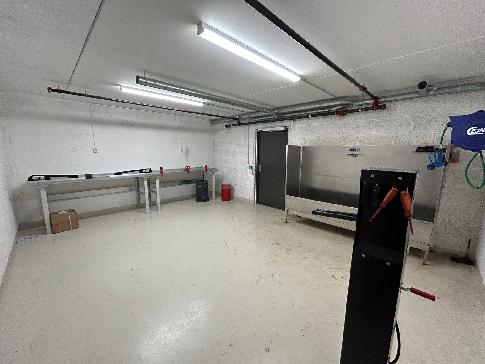 Felles bod tilrettelagt med sykkelvask, verksted og smørestasjon. Galleribilde