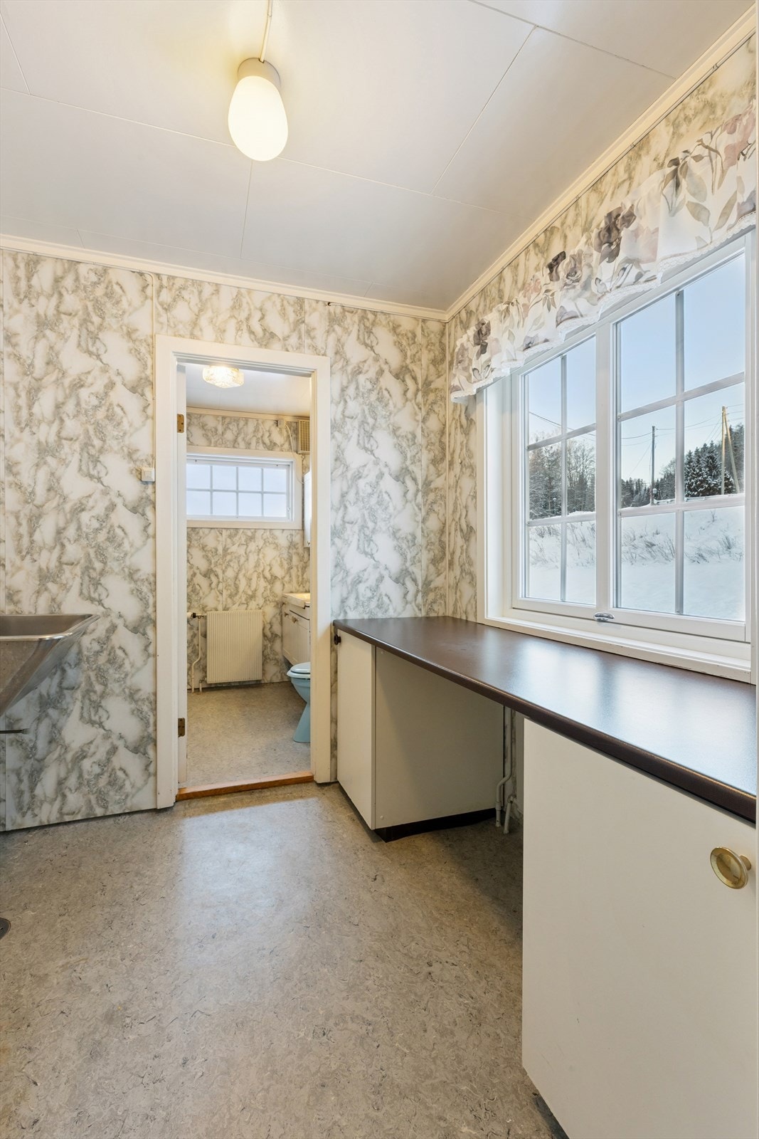 Vaskerom, tilknyttet boligens bad. Galleribilde