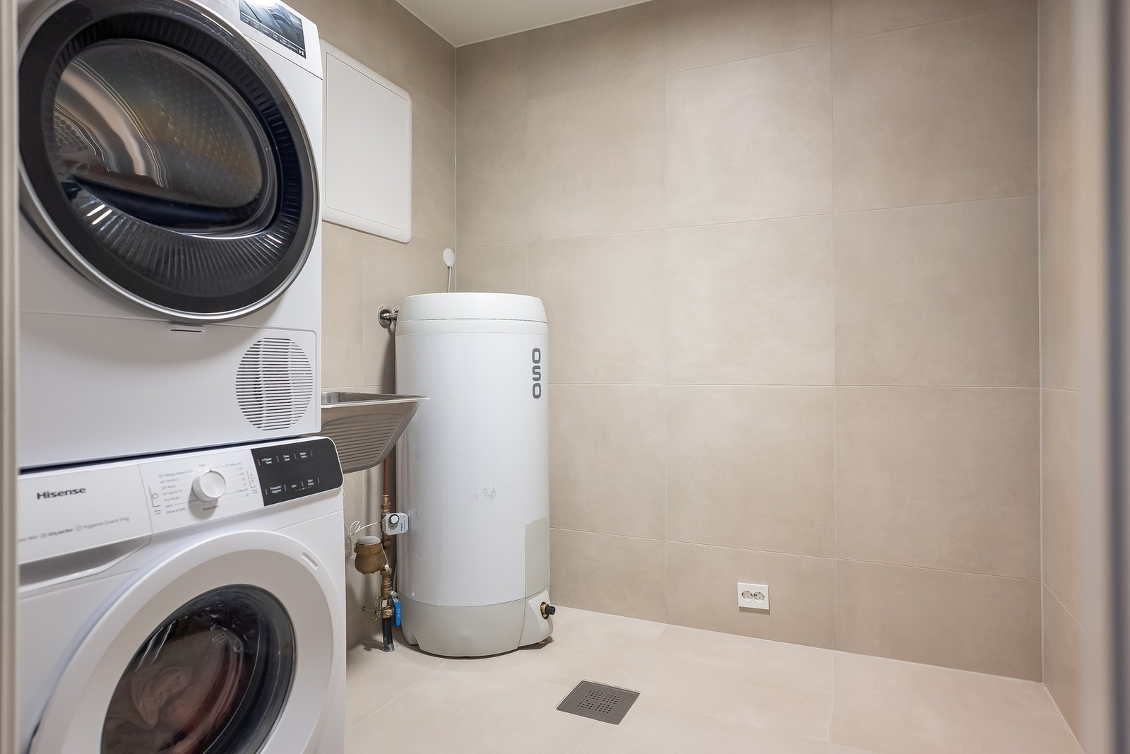 Praktisk separat vaskerom som kan ses på som en nødvendig gode for barnefamilier. Galleribilde