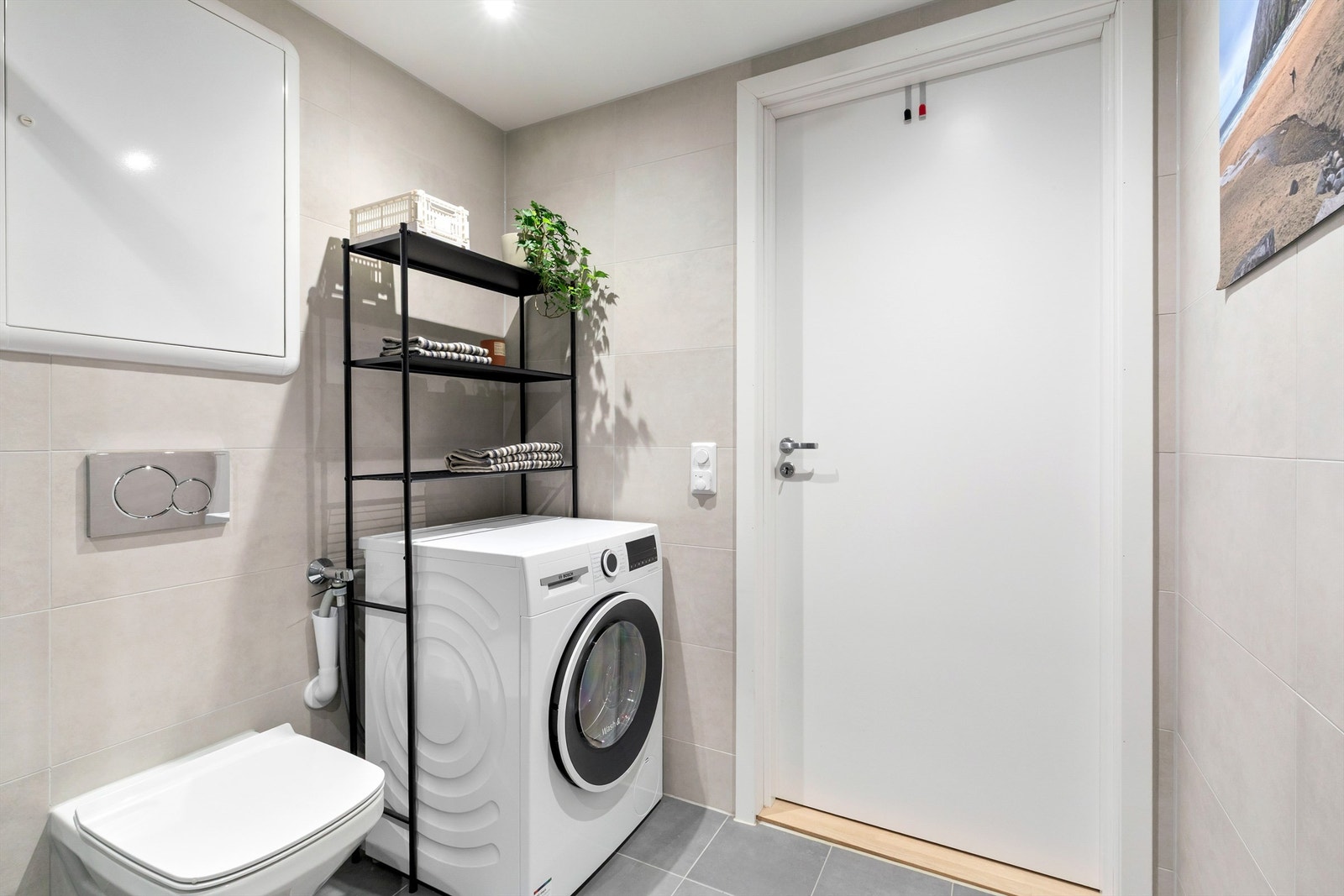 Det er opplegg for vaskemaskin på badet Galleribilde