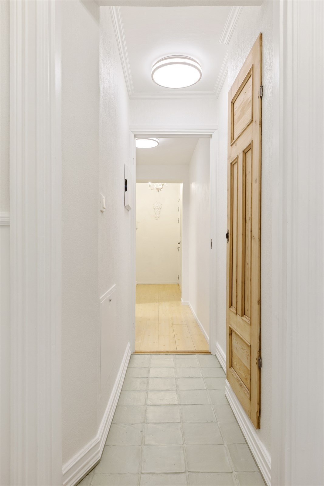 Gangen sikrer god flyt i leiligheten. Galleribilde