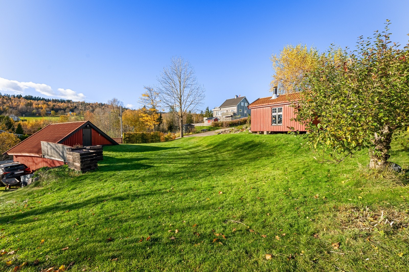 Denne innbydende hagen gir eiendommen et ekstra løft. Galleribilde