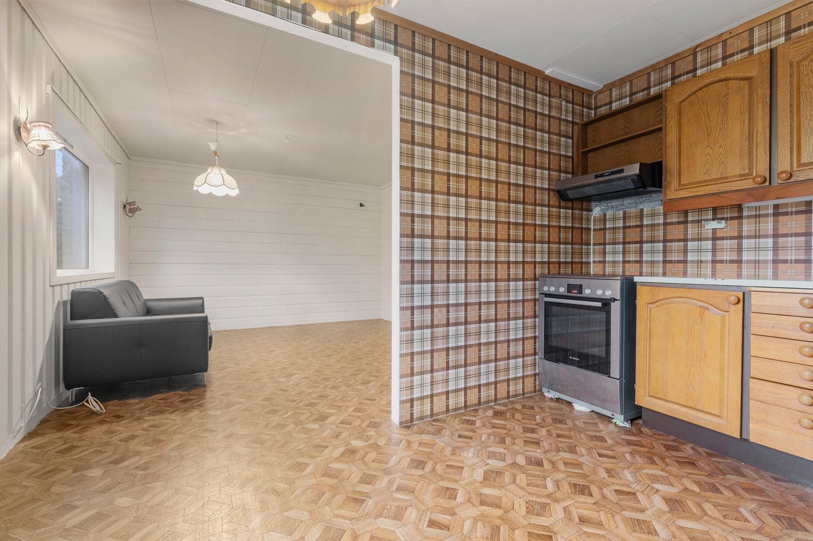 Dels åpen løsning med kjøkken Galleribilde