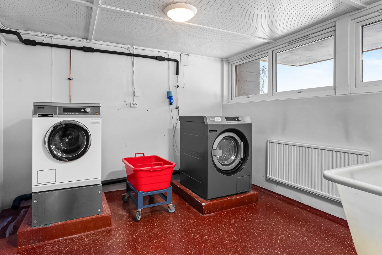 Beboere har tilgang på felles vaskeri. Galleribilde