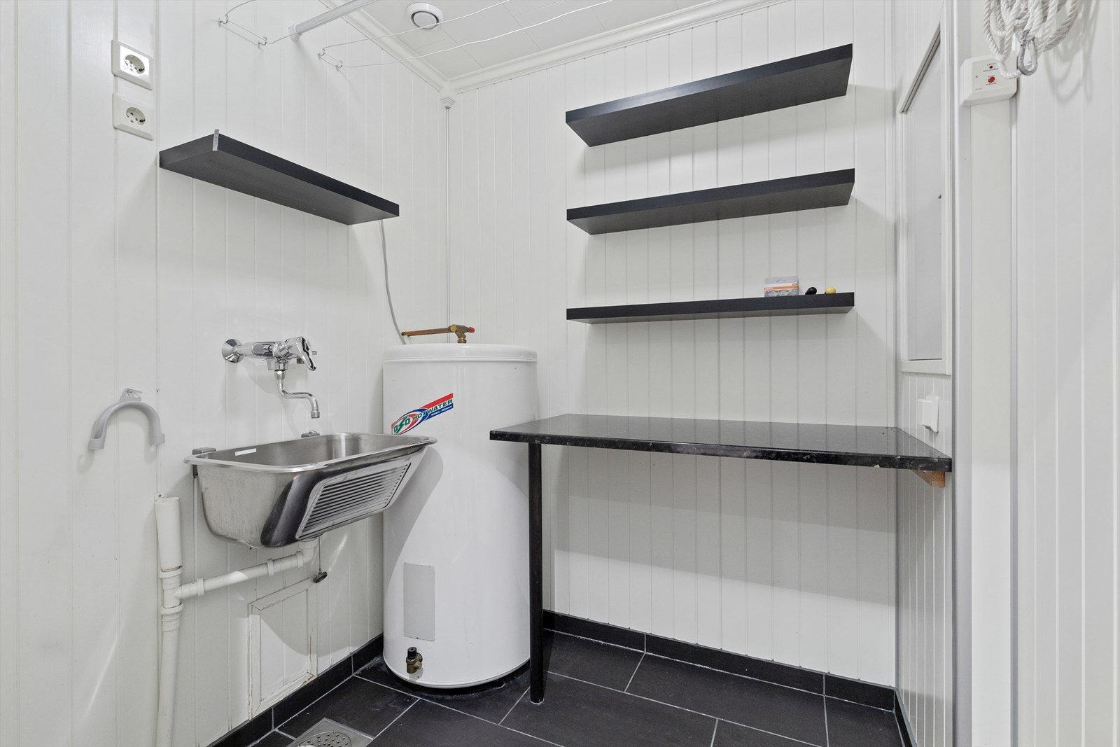 Seksjonen har også et praktisk vaskerom med bodareal Galleribilde