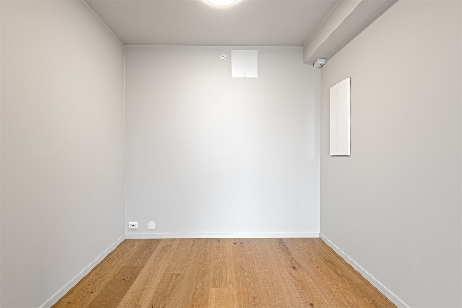 Den effektive planløsningen gjør at sovealkoven føles som en egen, lun del av leiligheten. Galleribilde