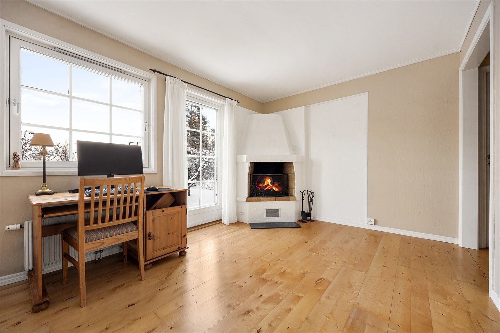 Peisen gir en lun atmosfære på kalde dager. Galleribilde