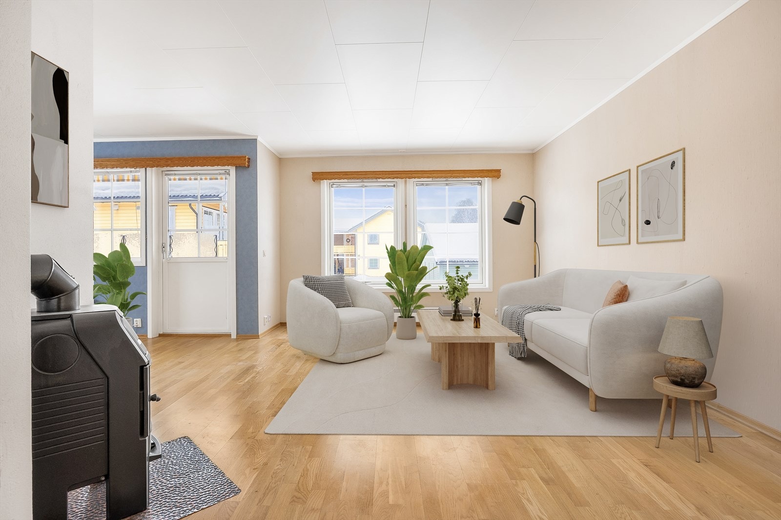 Stue i åpen løsning med kjøkken og med utgang til balkong. Her digitalt illustrert med møbler. Galleribilde