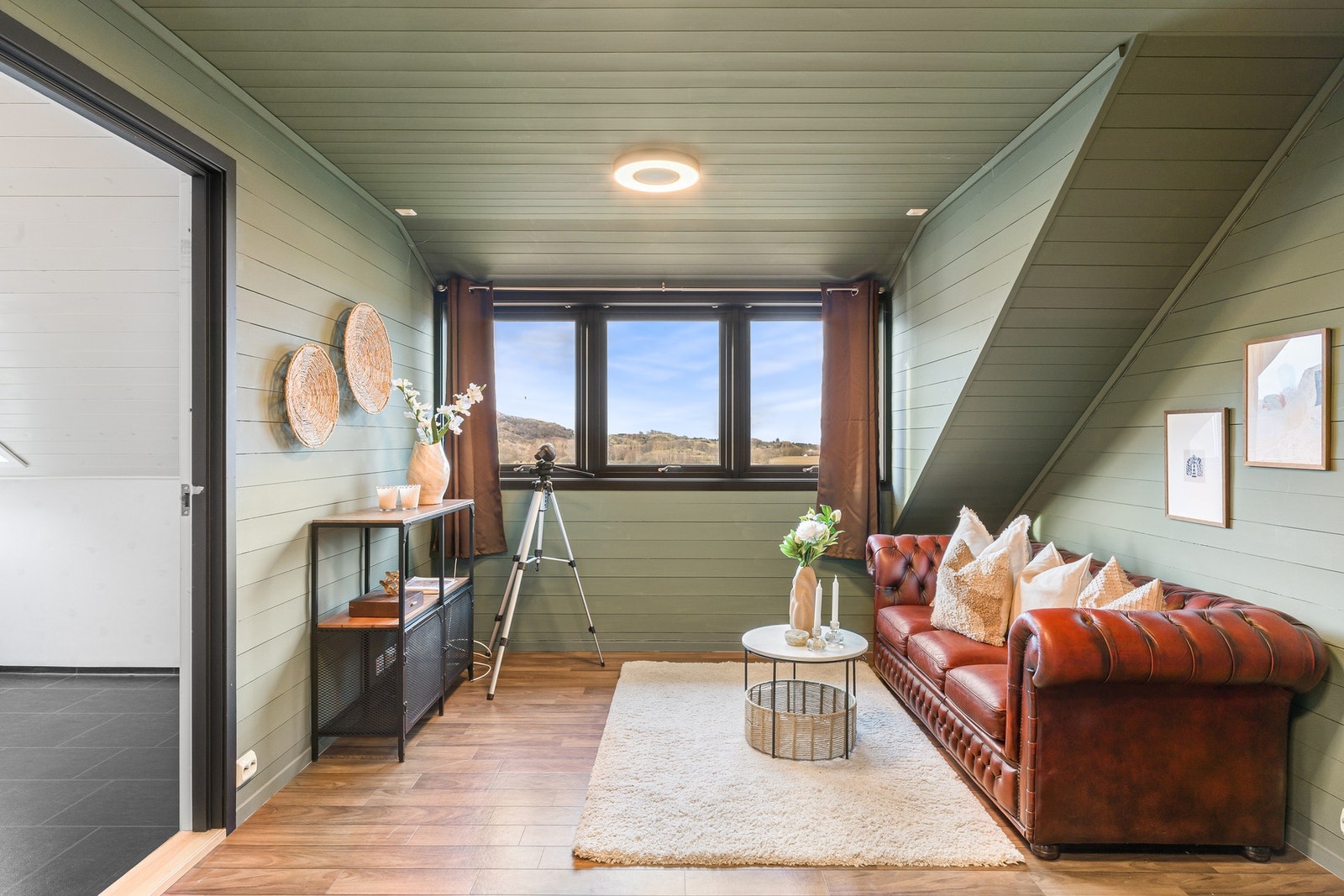 Loftstuen som egner seg godt som en ekstra oppholdsplass eller TV-stue. Galleribilde