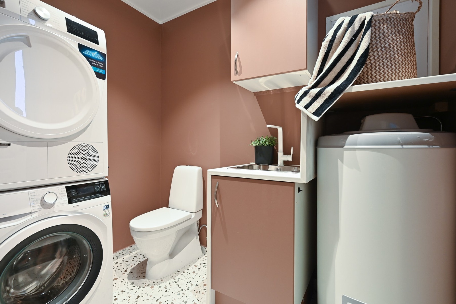 Eget vaskerom gir en effektiv og praktisk hverdag Galleribilde