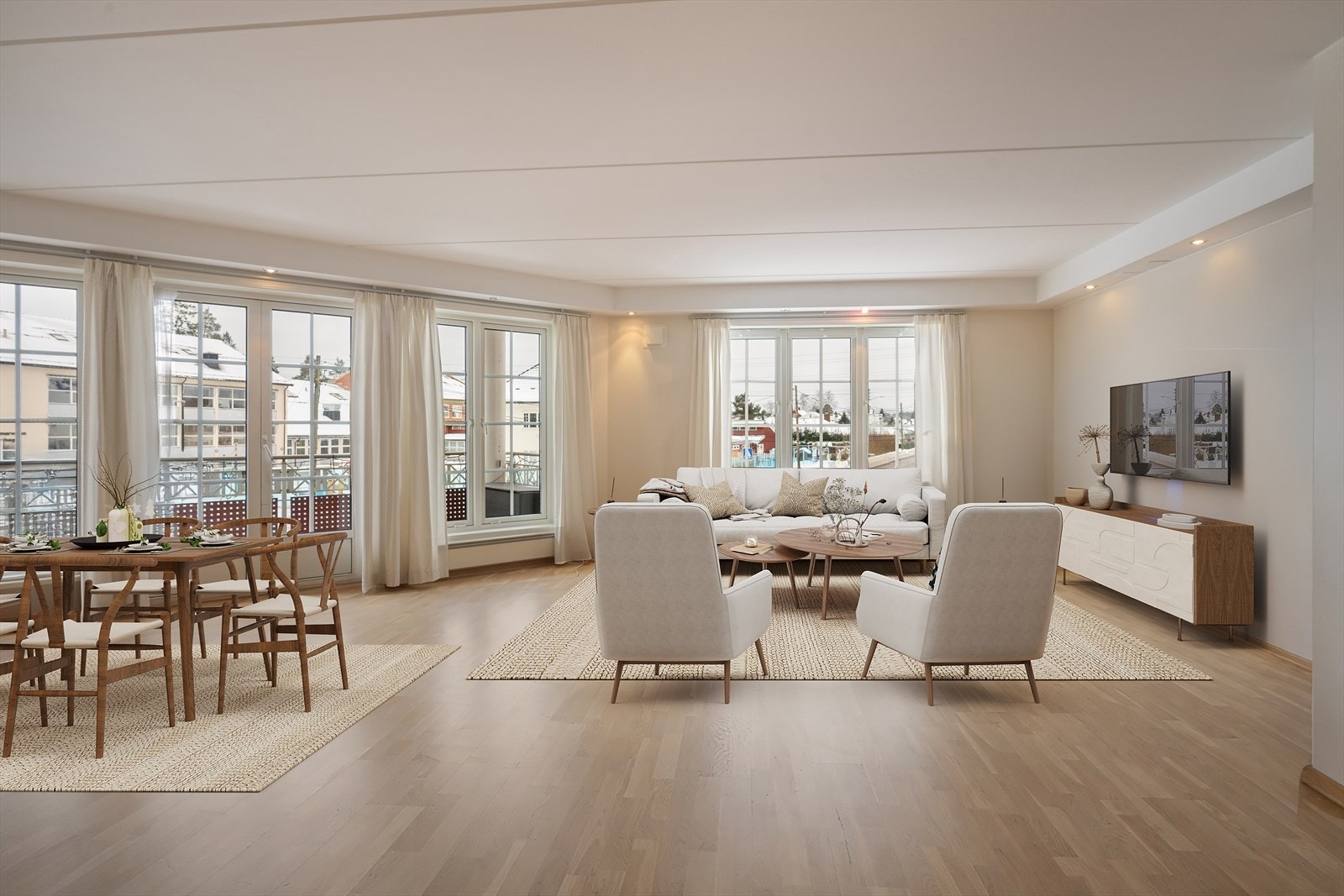 Leiligheten har en luftig åpen kjøkken- og stueløsning, tre romslige soverom og store vindusflater som slipper inn rikelig med naturlig lys. (Digitalt møblert bilde) Galleribilde