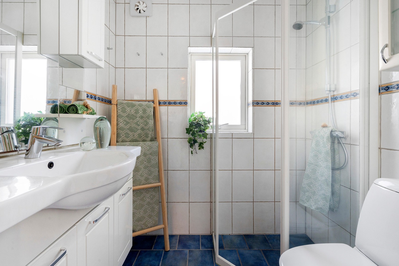 Flislagt bad med gulvvarme. Galleribilde