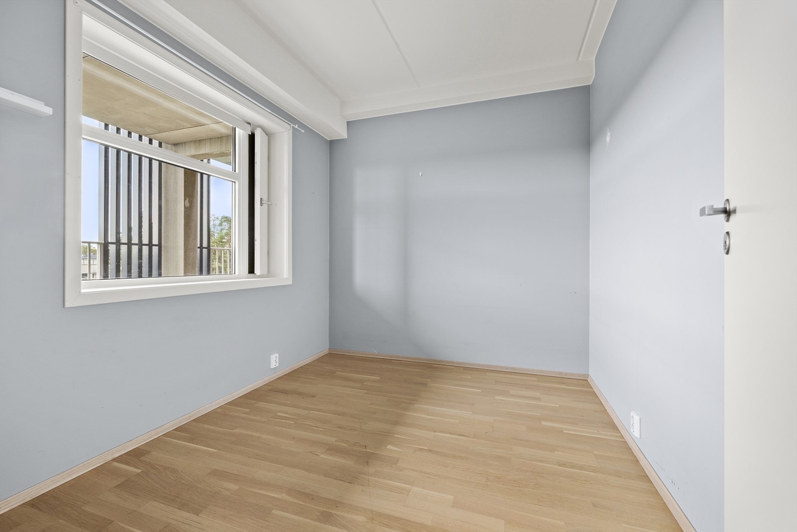 Leilighetens andre soverom passer perfekt som barnerom, kontor eller gjesterom. Galleribilde