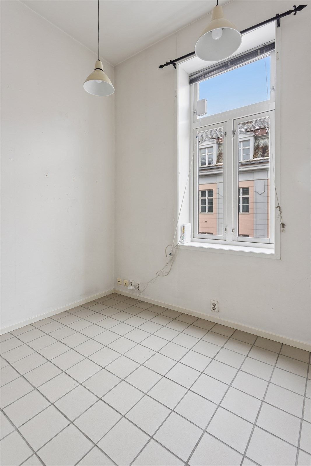 Dette er en arealeffektiv og smart 1-roms andelsleilighet beliggende i en klassisk bygård fra 1892. Galleribilde