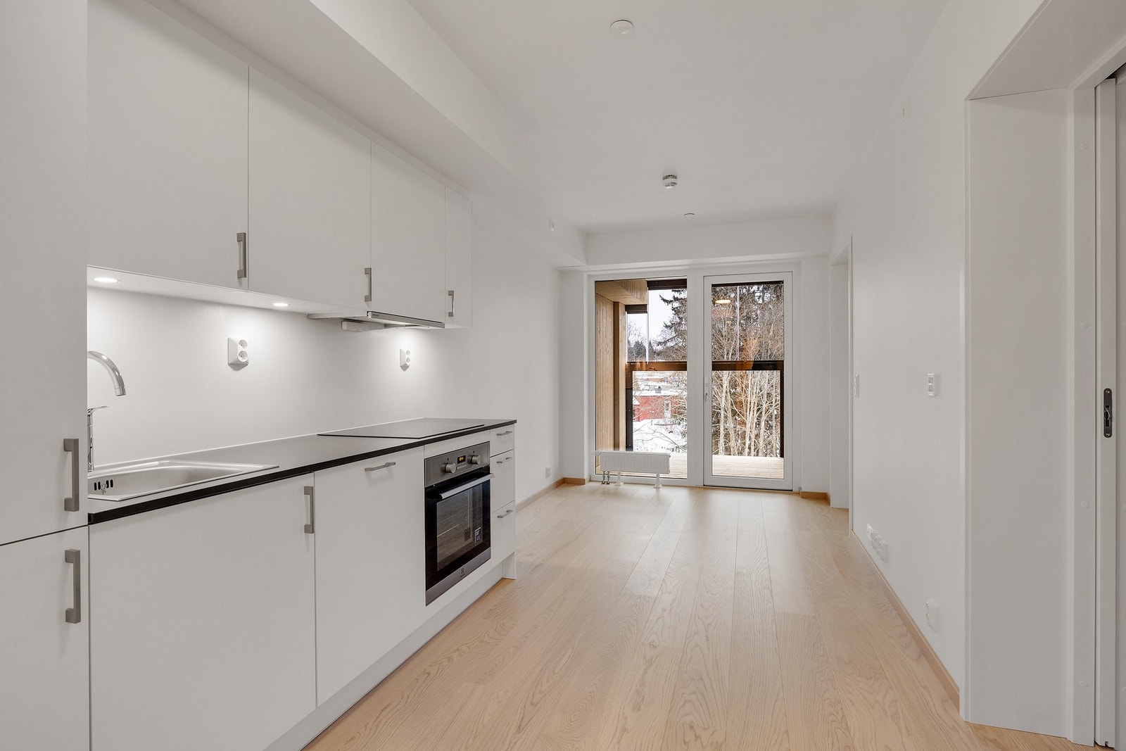 Lys stue med åpent kjøkken Galleribilde