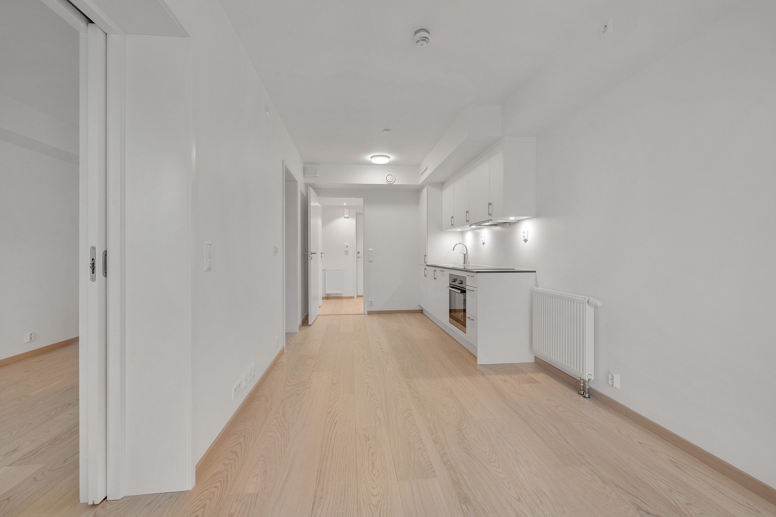 Det er vannbåren varme via radiatorer, inkludert i felleskostnadene Galleribilde