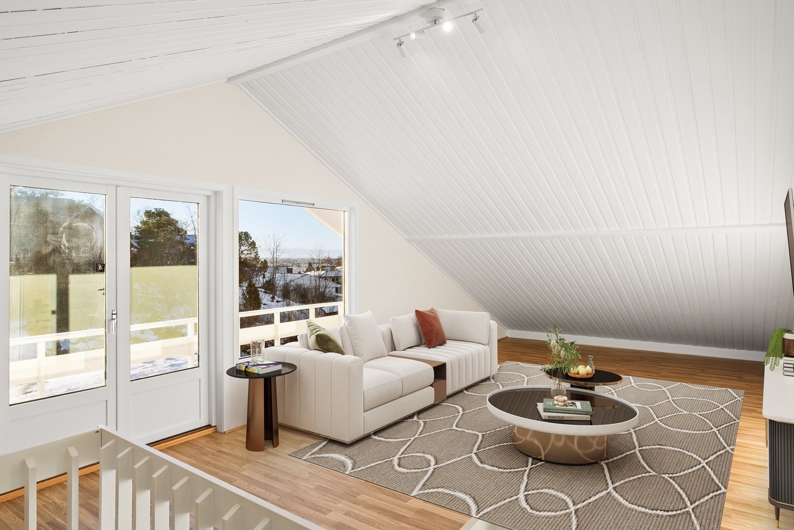 Her kan man trekke seg tilbake og nyte roligere stunder, enten det er som TV-stue, lesekrok eller en egen sone for ungdom i huset. De gode lysforholdene bidrar til en luftig atmosfære og gjør rommet behagelig å oppholde seg i gjennom hele dagen. Galleribilde